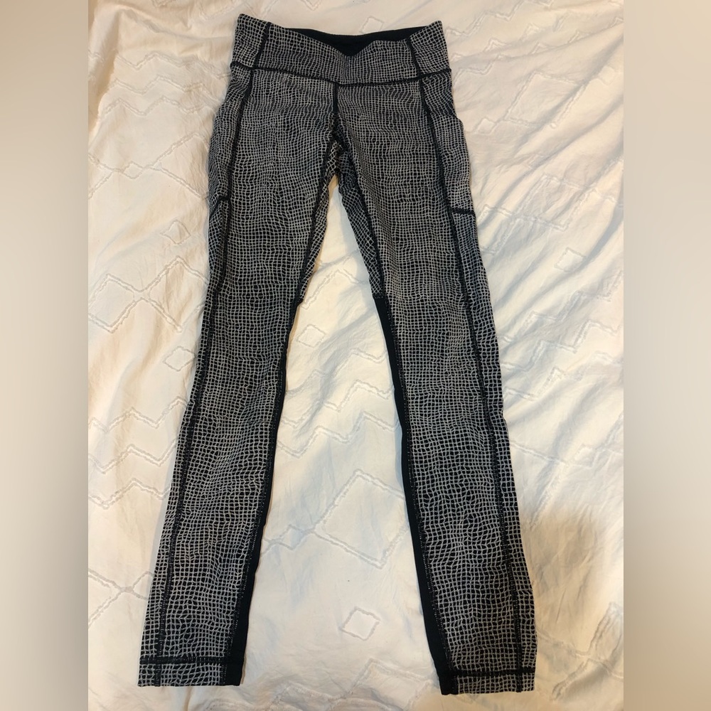 Black and white chair printed Lululemon leggings.  Size 4.  Mesh detail.
